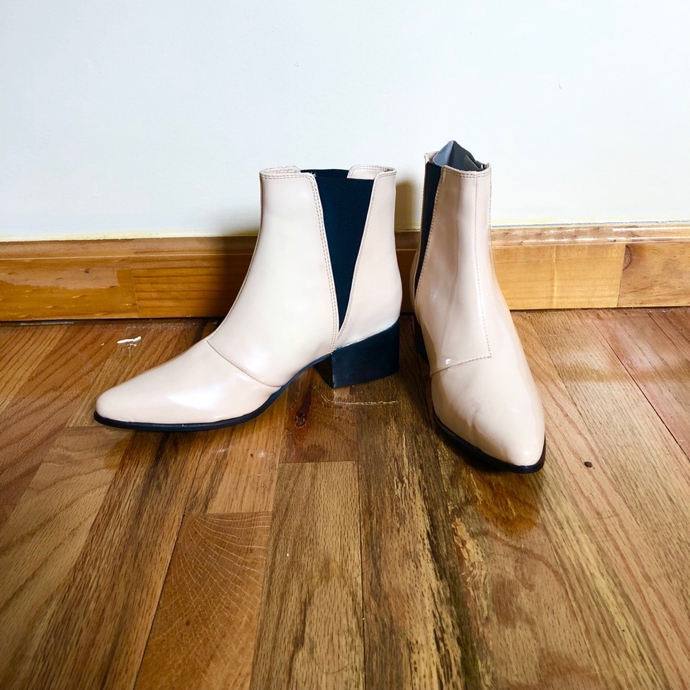 Never been worn urban outfitters boots in nude